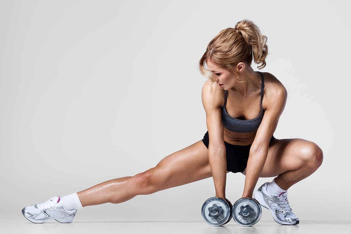 Woman doing side lunge