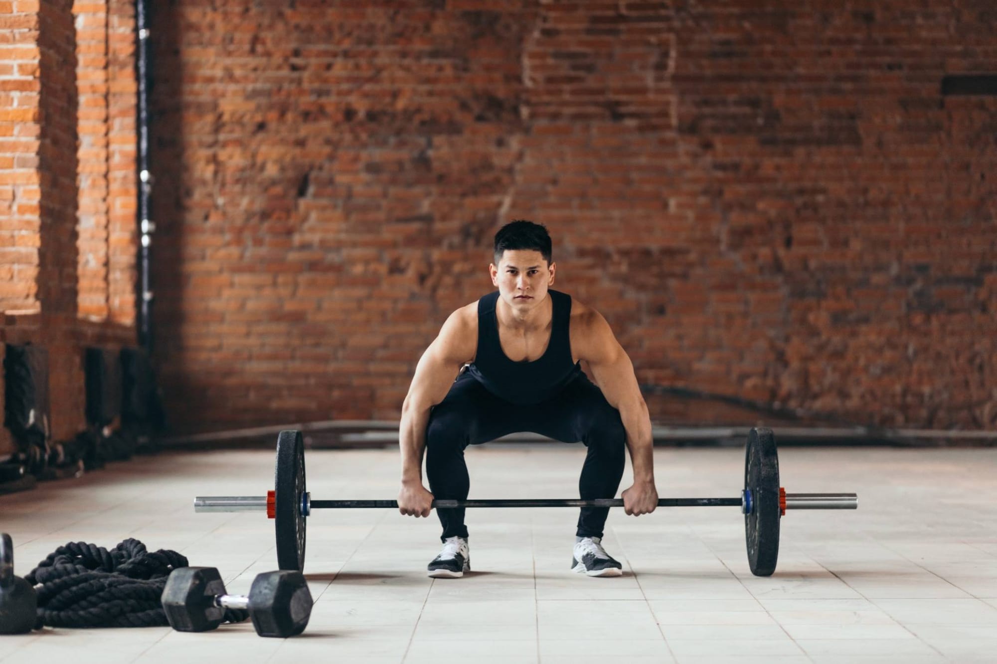 Man preparing to deadlift.